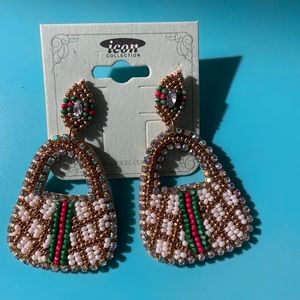 Brand new Purse style pierced earrings. Brand new.